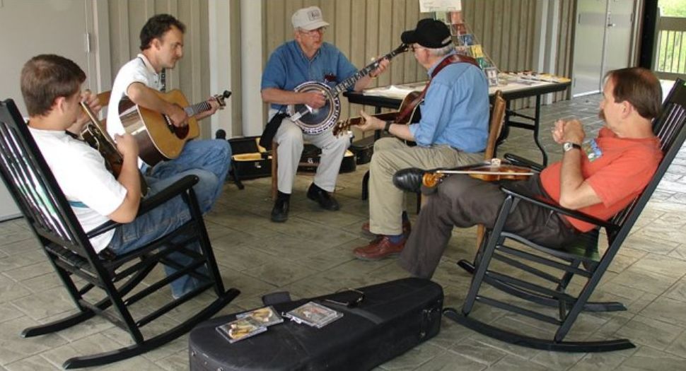 Musicians gathering on the breezeway at the Blue Ridge Music Center
